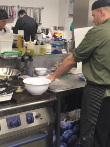 Chef places Dycem Mat on work surface